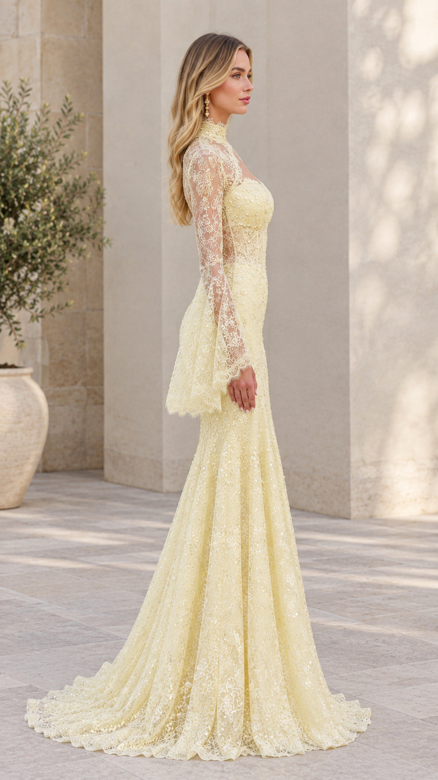Side profile of light yellow sequin lace mermaid gown showcasing fitted silhouette and train