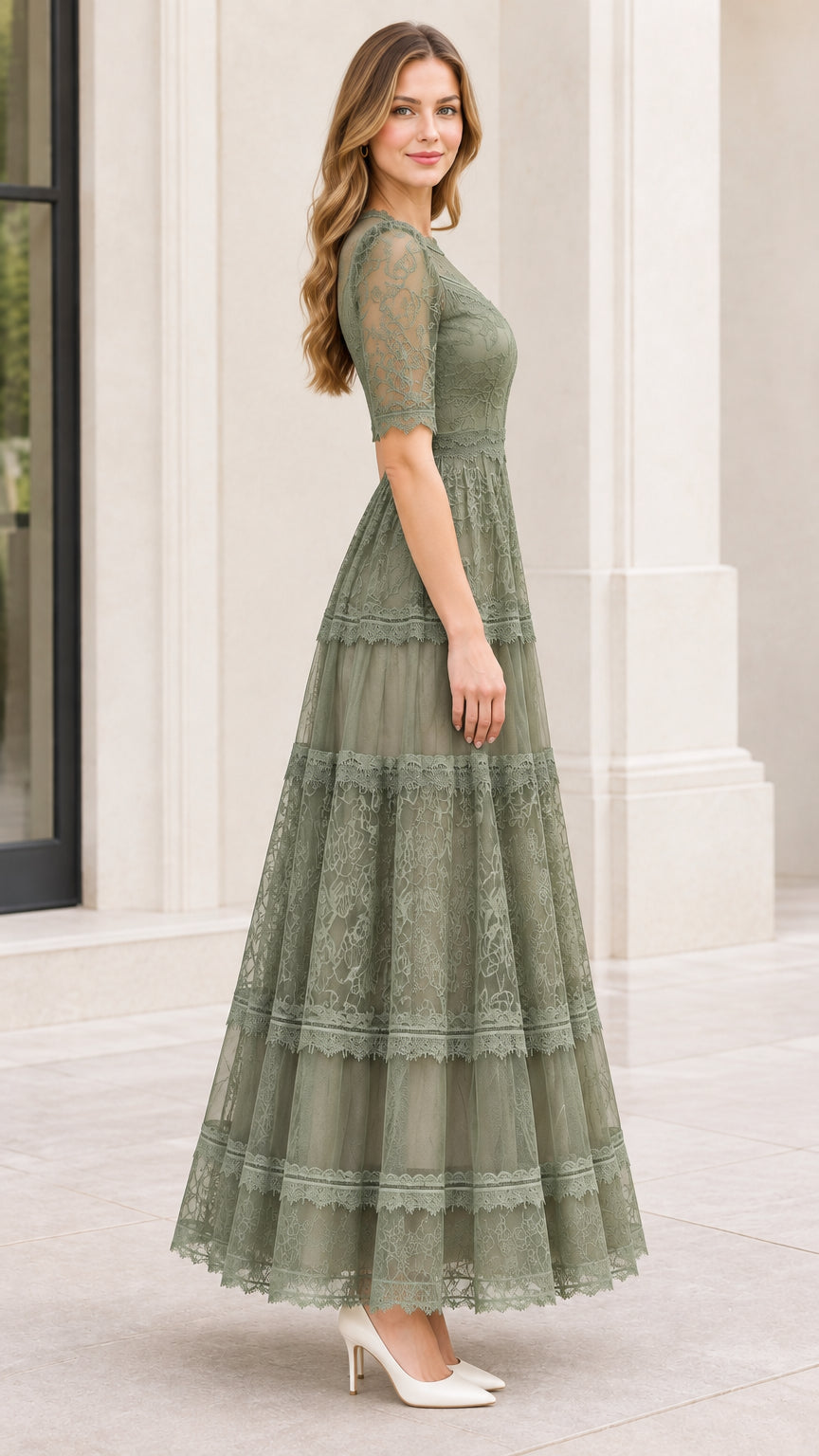 Side profile of model in sage green tiered lace formal dress with half sleeves