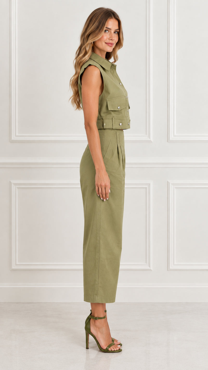 Side profile view of Olive Green cropped top and pleated cropped trousers set