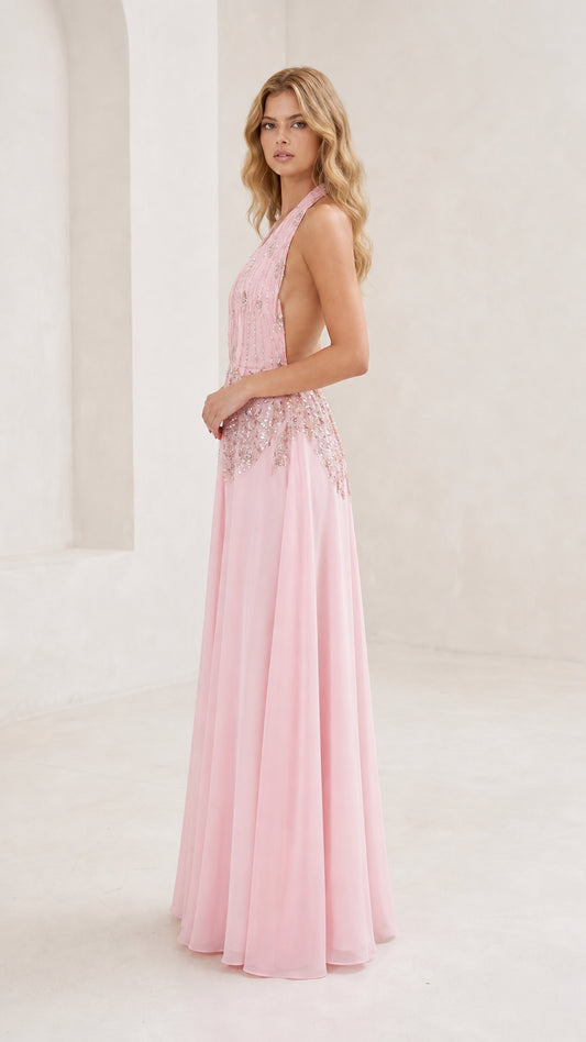 Side profile of pink evening gown on model