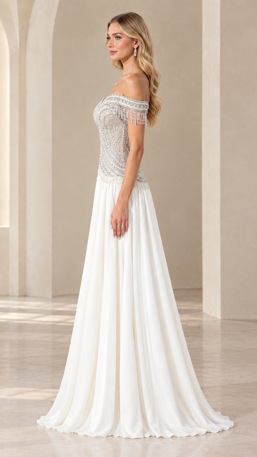 Side view of white beaded formal dress with off-the-shoulder drape and long skirt