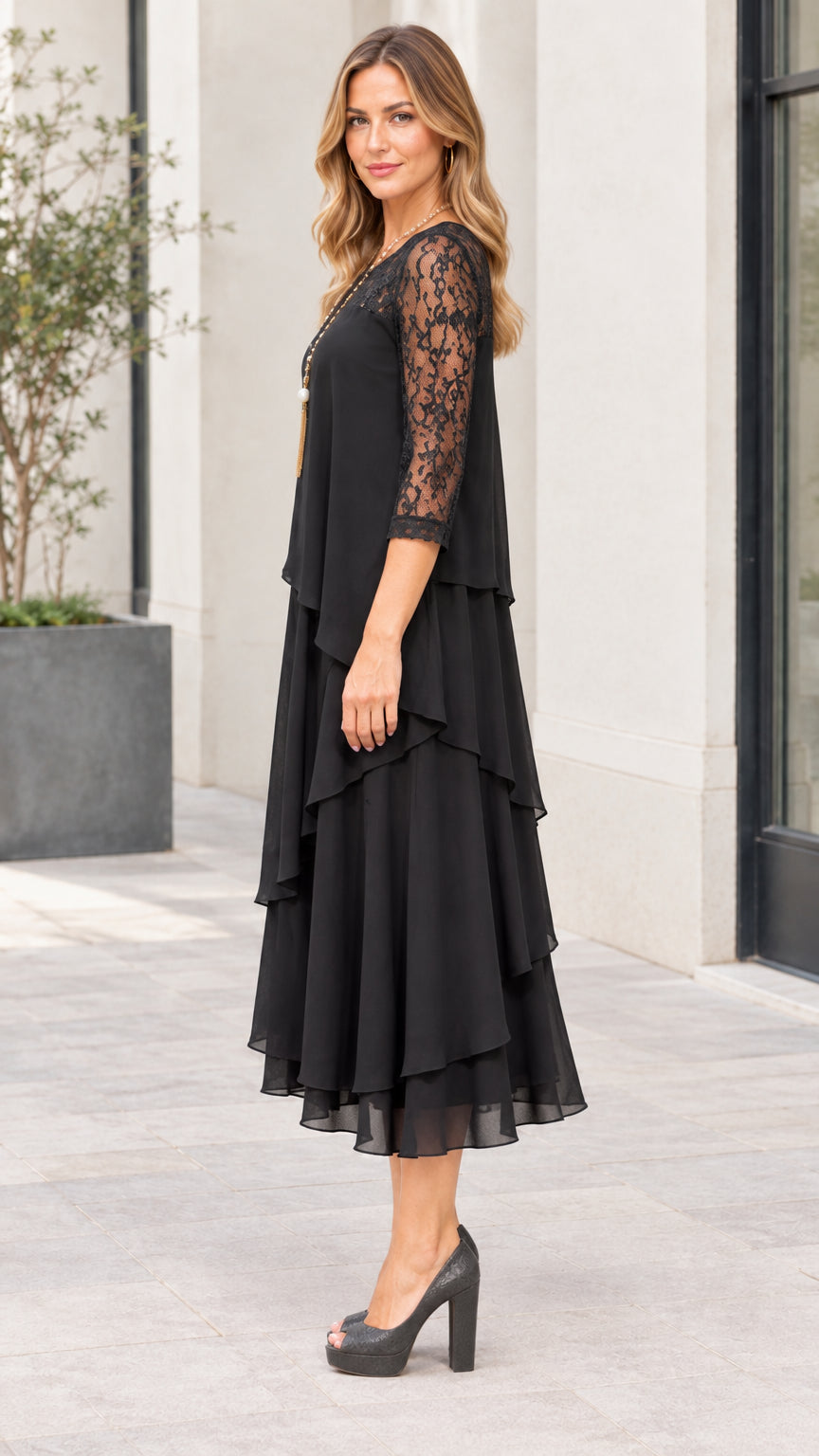 Side profile of black 3/4 sleeve asymmetrical tiered chiffon midi dress