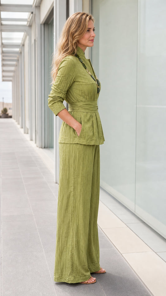 Side profile of woman in sage green matching set showing pocket detail