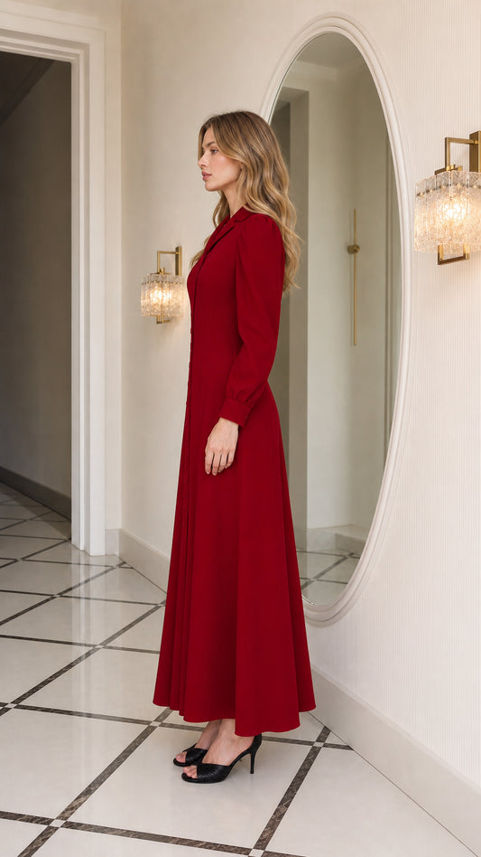 Side profile view of burgundy long sleeve maxi dress