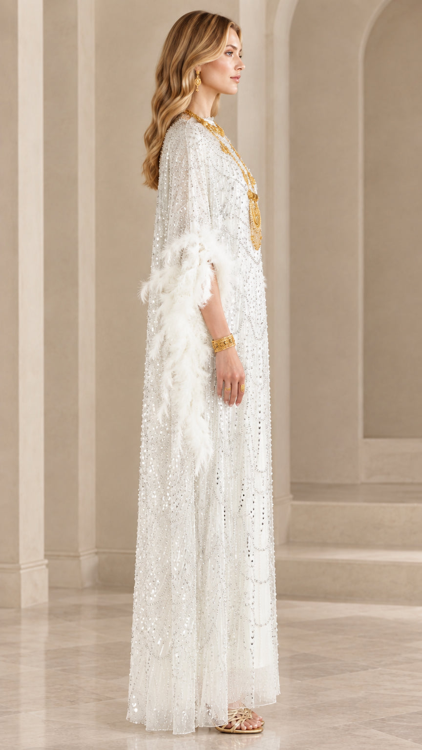 Side profile of white sequined evening kaftan dress with feather cuffs