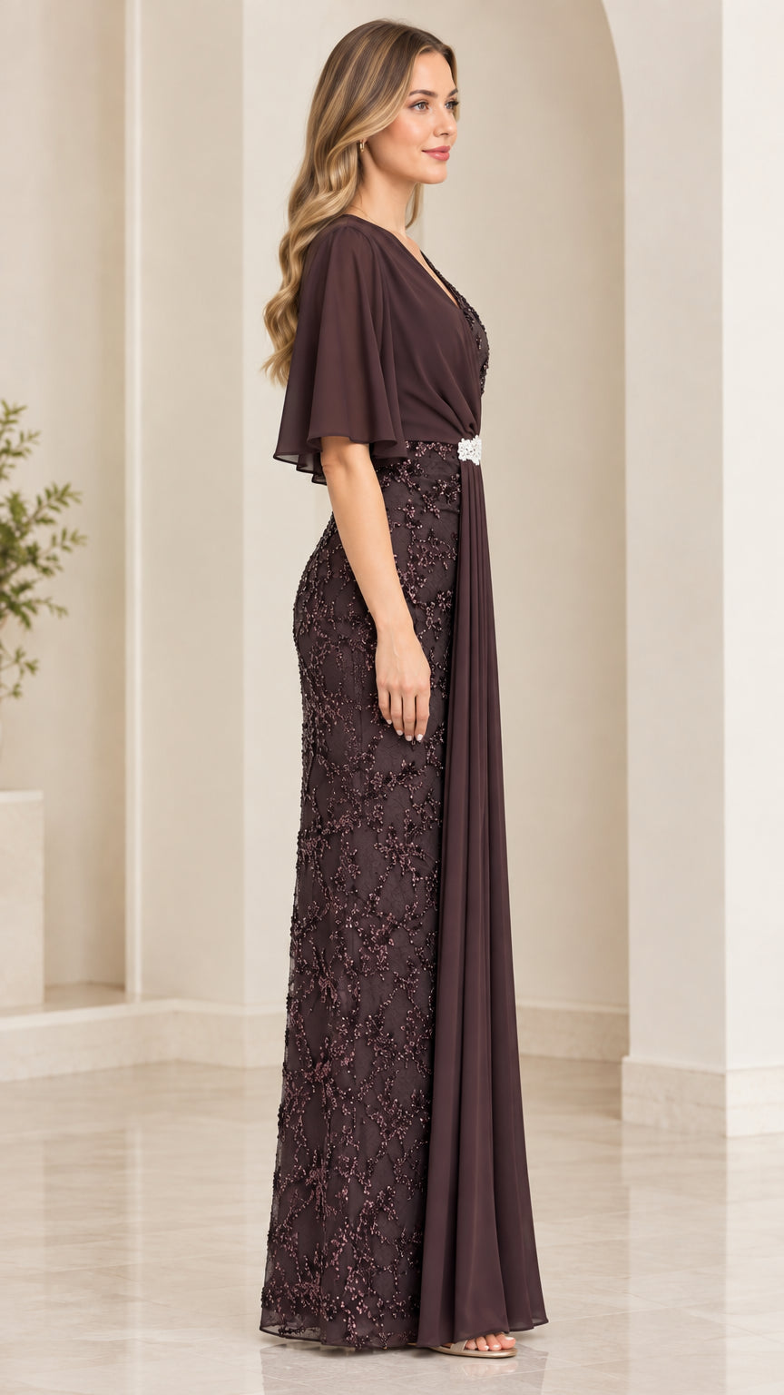 Side profile view of dark plum formal gown showing draped chiffon silhouette