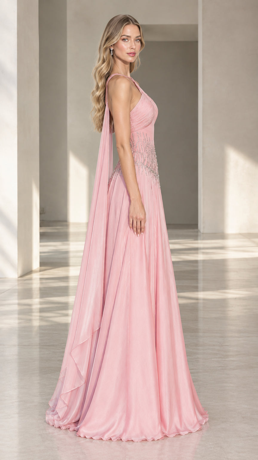 Side profile of pink halter chiffon maxi dress showing draped cape streamer