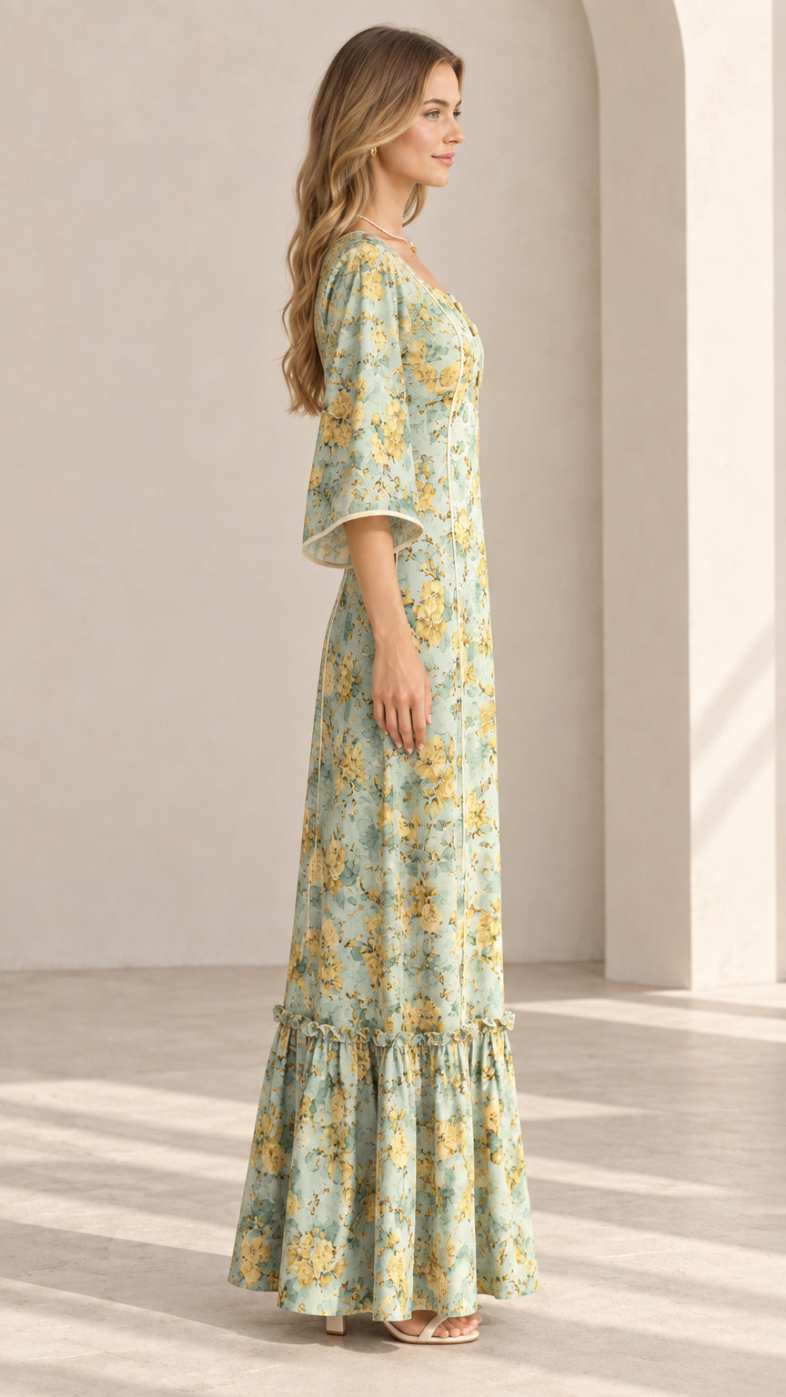 Side profile of Sage Green floral maxi dress showing fluid drape