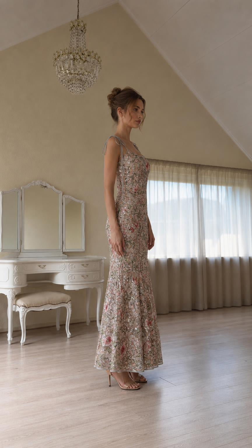 Side profile view of champagne sequin maxi dress