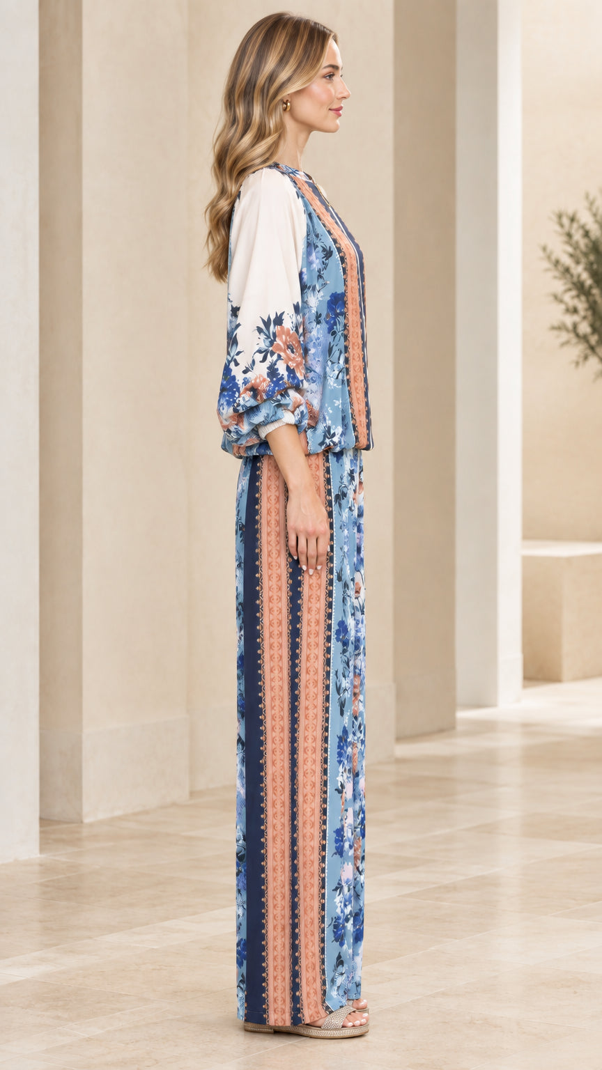 Side profile of model wearing Light Blue floral two-piece pant set