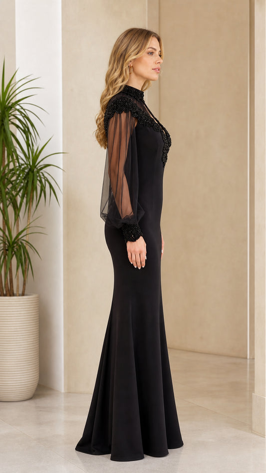 Side profile view of black evening gown