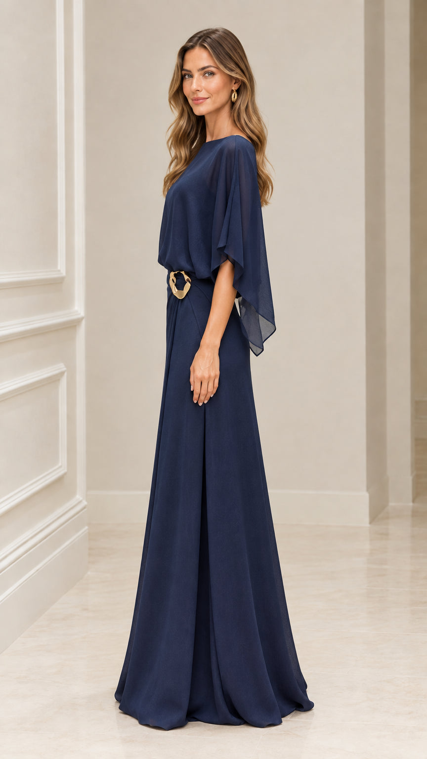Side profile of model wearing Navy Blue draped cape evening gown