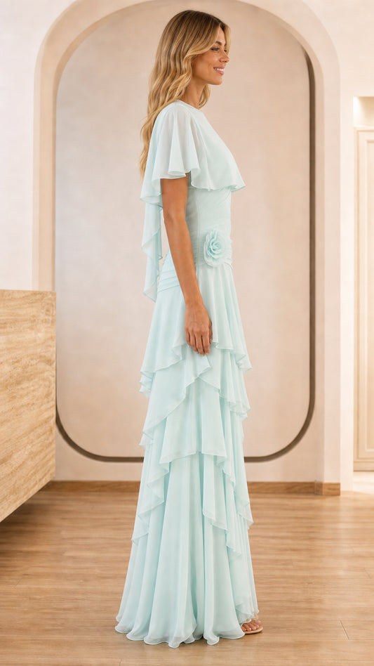 Side profile of light blue evening gown with rosette accent