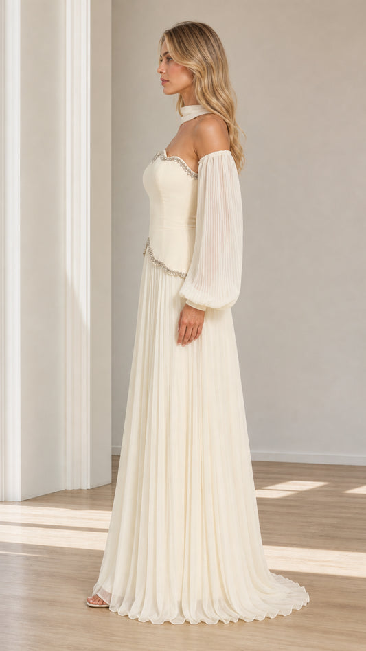 Side profile view of ivory beaded scalloped maxi evening dress with pleated lantern sleeves