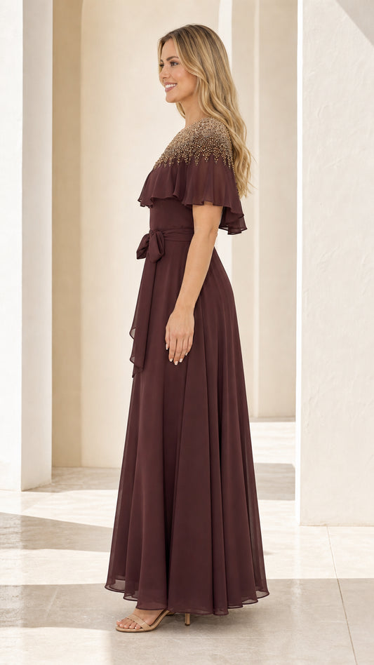Side profile view of burgundy evening maxi dress