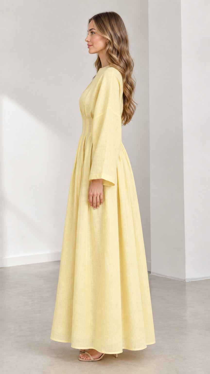 Side profile of woman in Light Yellow linen-look A-line maxi gown
