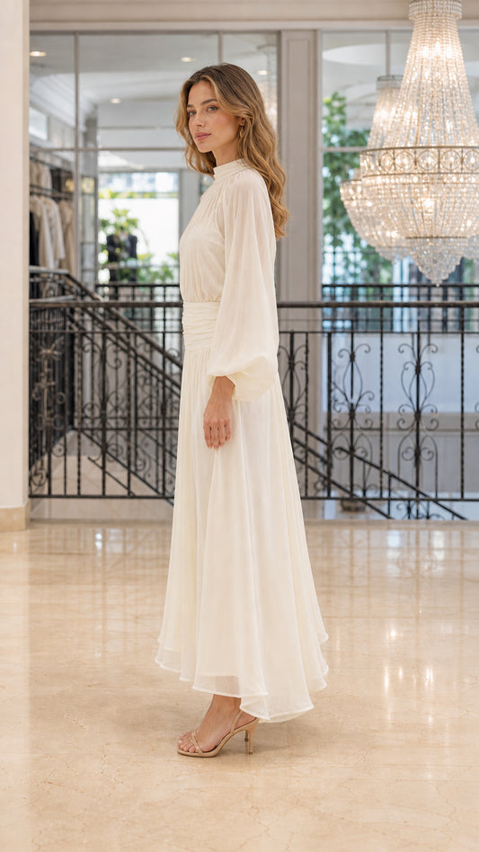 Side profile view of Ivory chiffon maxi dress