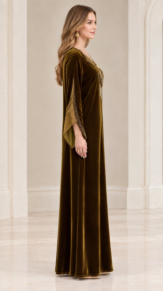 Side profile view of olive green velvet maxi dress showing sleeve shape and drape