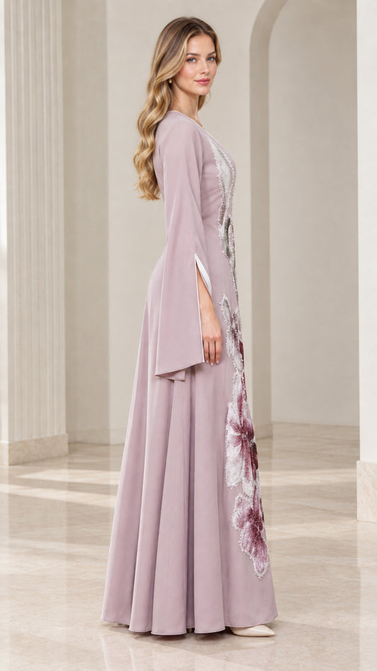 Side profile of dusty lilac embroidered maxi dress showing flared sleeve silhouette