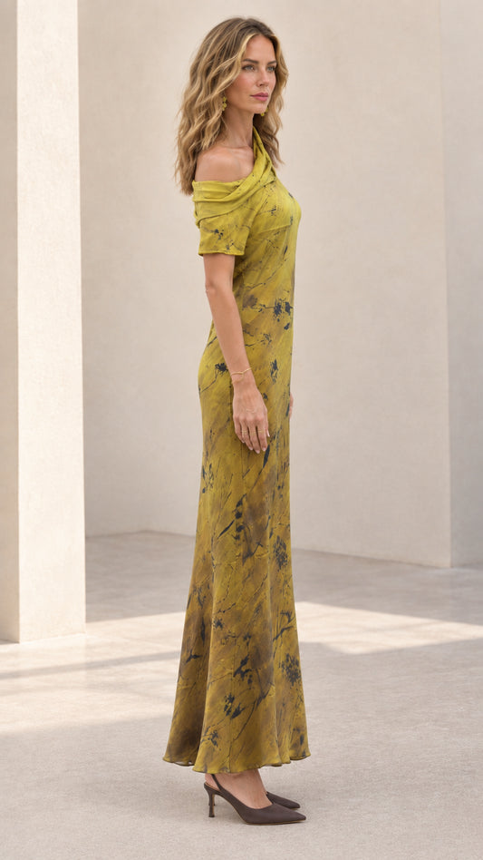 Side profile view of woman modeling the olive green draped maxi dress