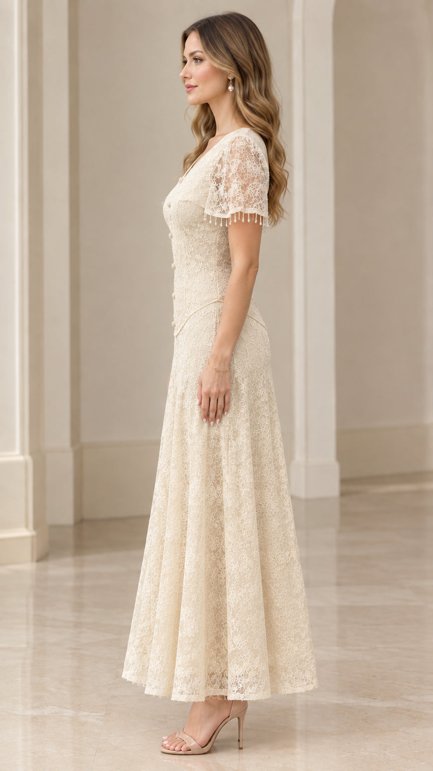 Side profile of woman in champagne lace evening maxi dress