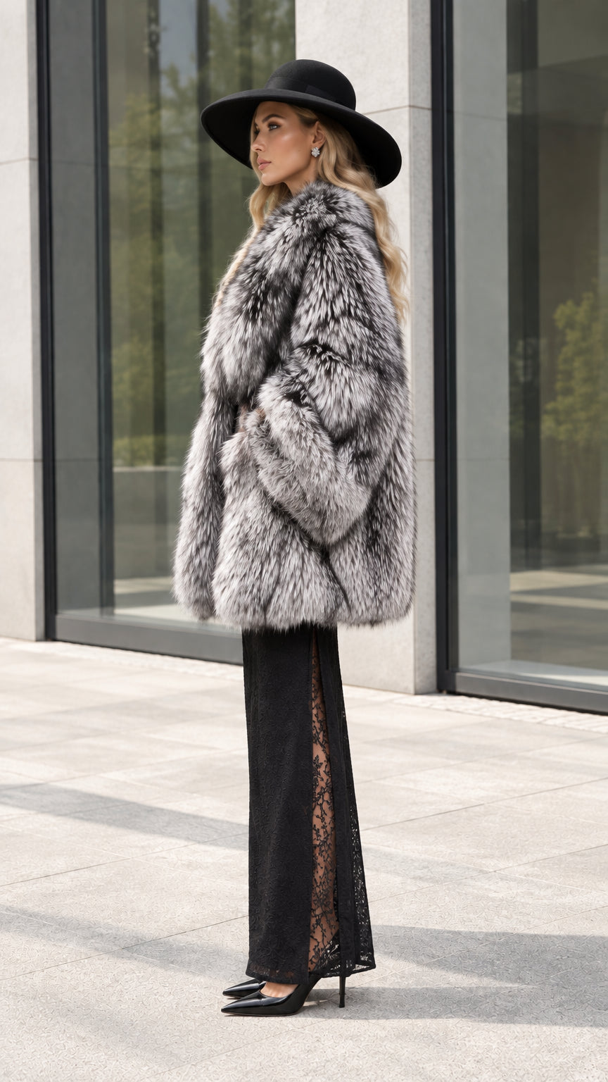 Side profile view of model wearing Silver Grey faux fur coat showing relaxed silhouette and sleeve volume