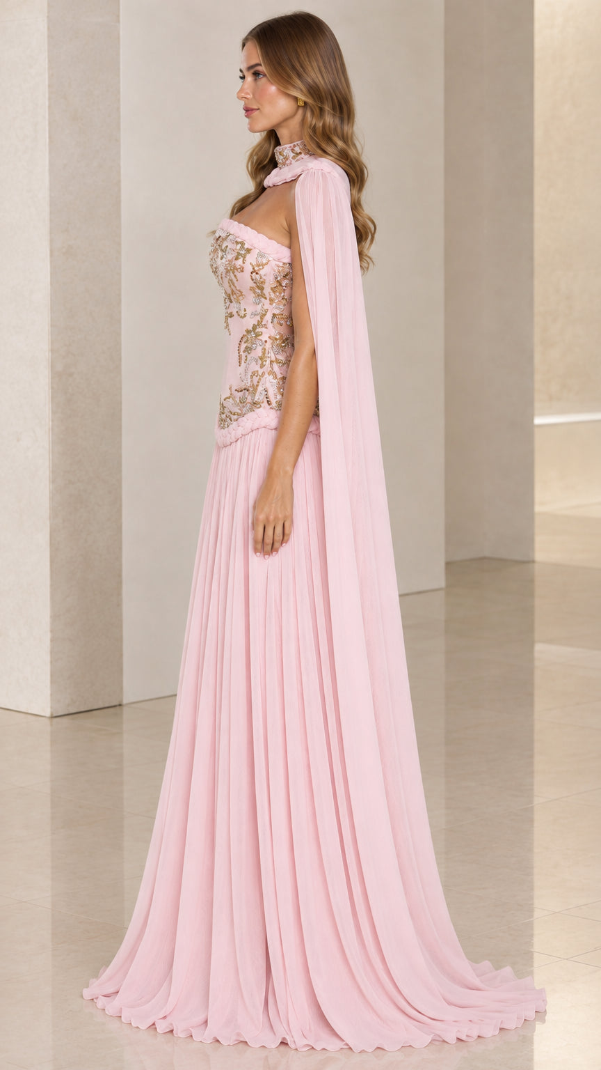 Blush pink formal cape gown side angle showing draped cape and pleated skirt