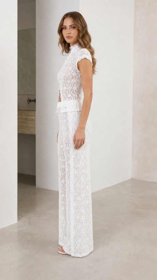 Side profile view of white lace two-piece set