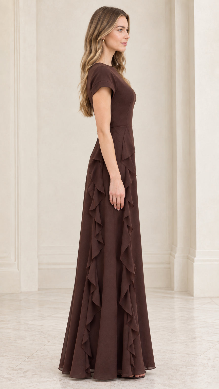 Side profile view of chocolate brown short sleeve ruffle evening gown