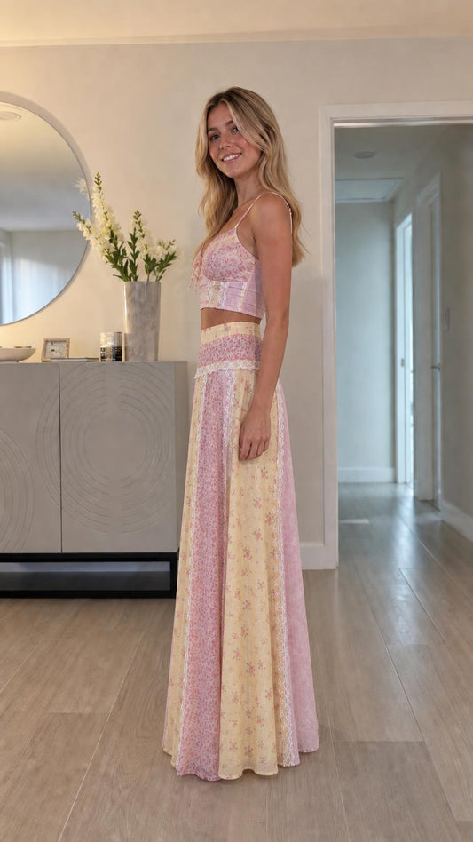 Side profile of model in pink multi two-piece set