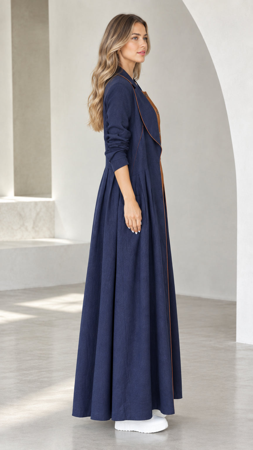 Side profile view of Navy Blue floor-length duster coat