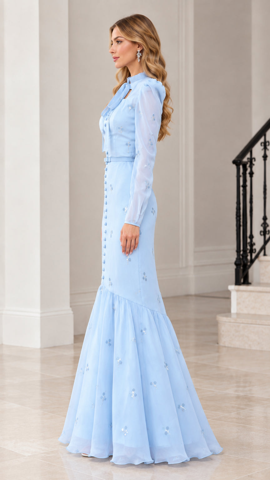 Side profile of light blue mermaid formal dress with puff sleeves and tie neck