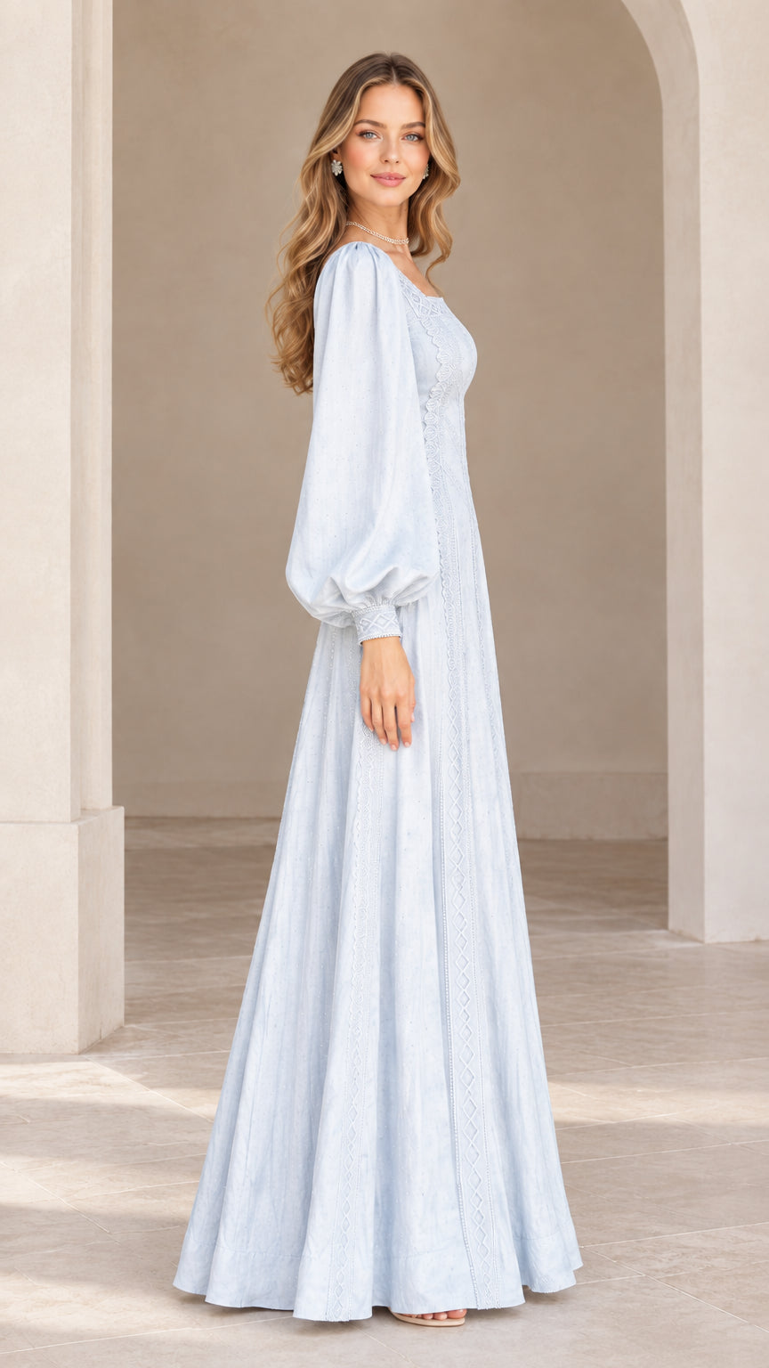 Side profile view of model wearing Light Blue vintage-style long sleeve maxi dress
