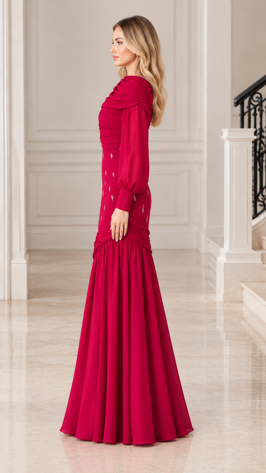 Side angle of model wearing floor-length Raspberry formal gown showing fitted silhouette and flared skirt