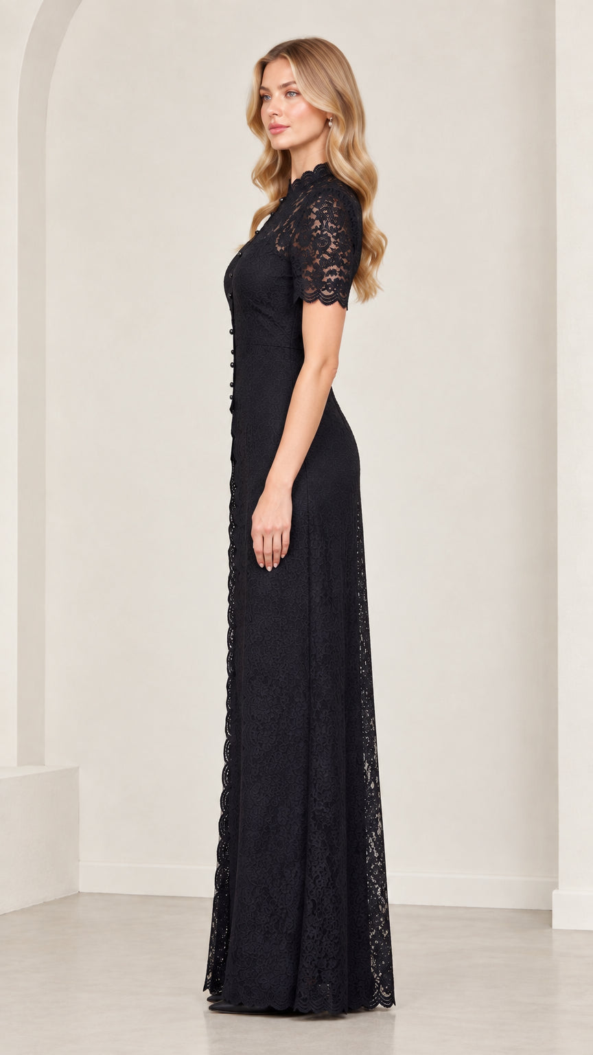 Side profile view of model wearing black floral lace wide-leg jumpsuit