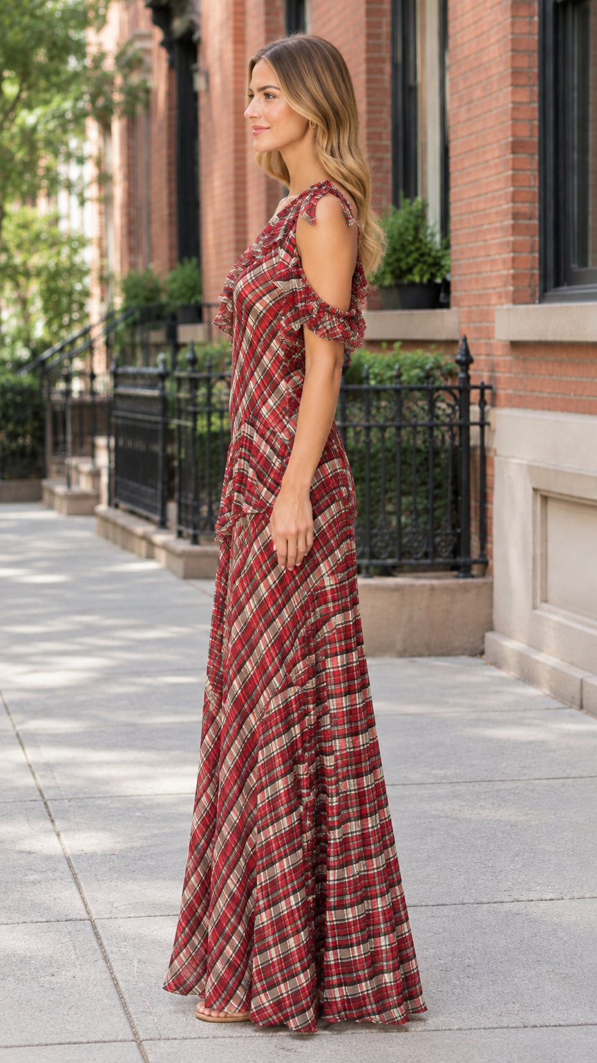 Side profile view of woman modeling burgundy plaid one-shoulder long dress