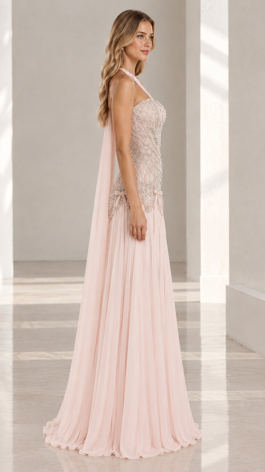 Side profile view of blush pink formal dress showcasing fit and drape
