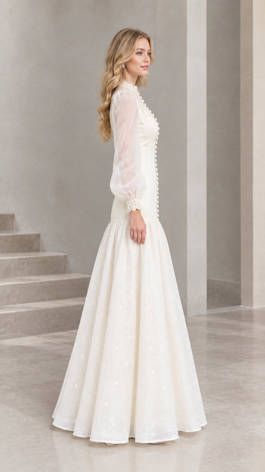 Side profile of Ivory vintage puff sleeve A-line maxi gown