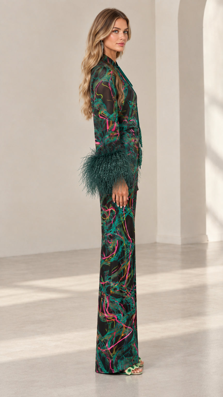 Side full-length view of Emerald Black printed satin two-piece outfit with wide-leg pants