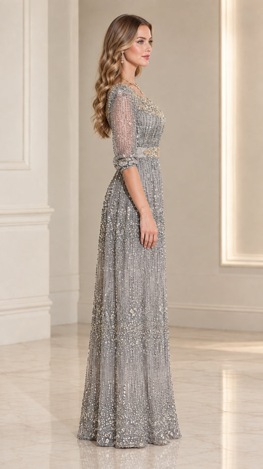 Side profile view of silver sequined formal maxi gown with A-line skirt