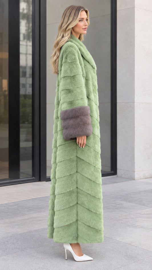 Side profile view of women's sage green long faux fur coat