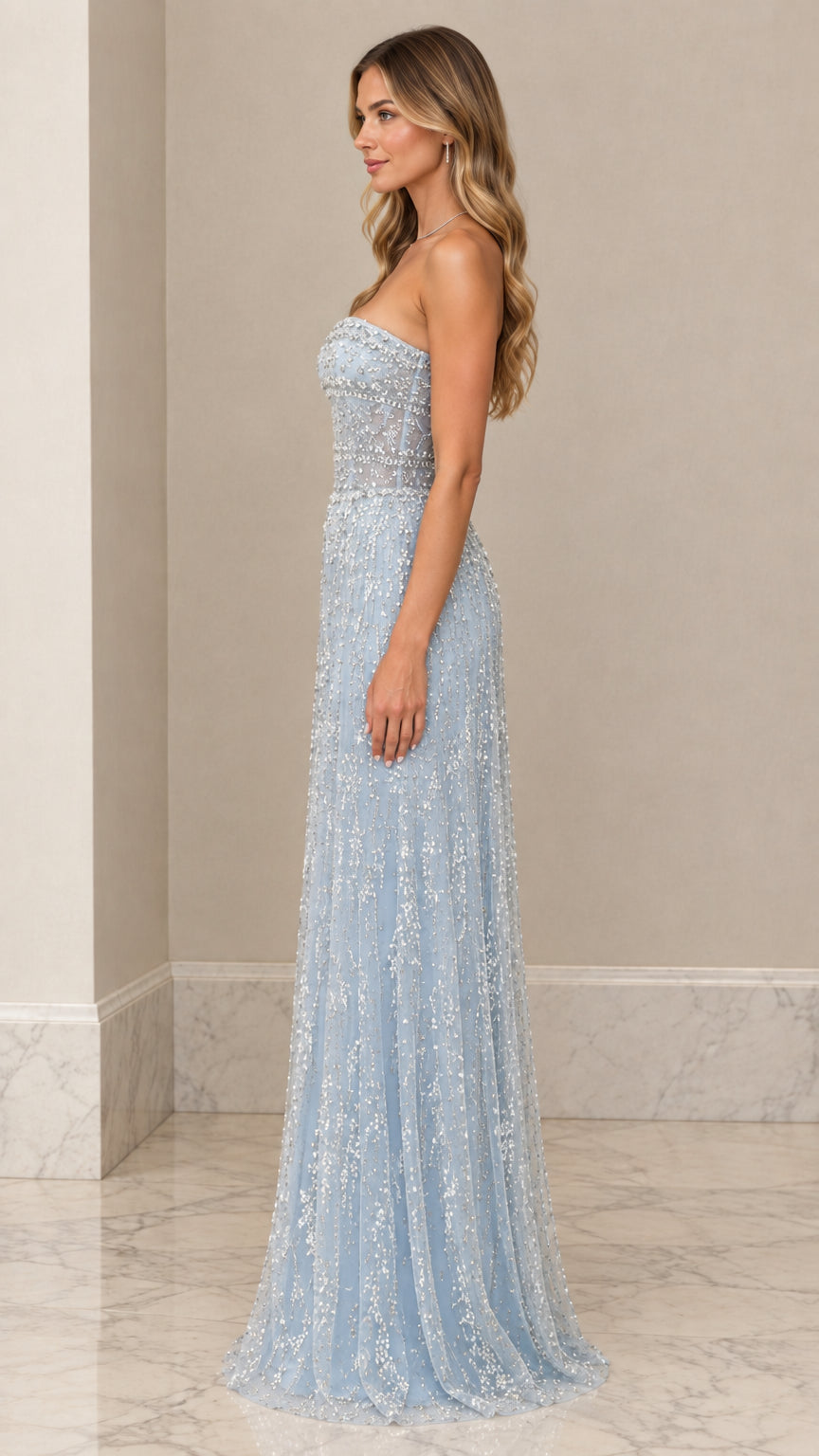 Side profile of model wearing Light Blue strapless beaded maxi formal dress
