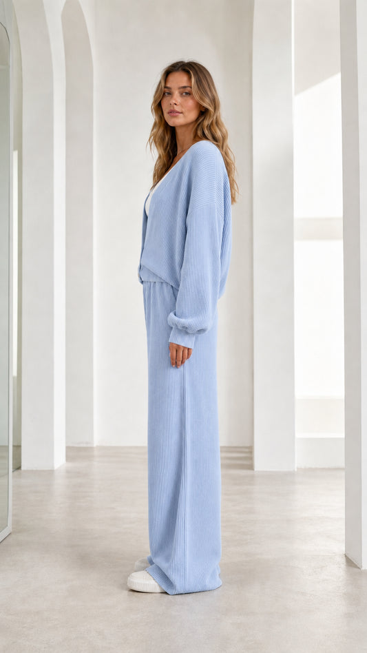 Side profile of woman in light blue lounge set