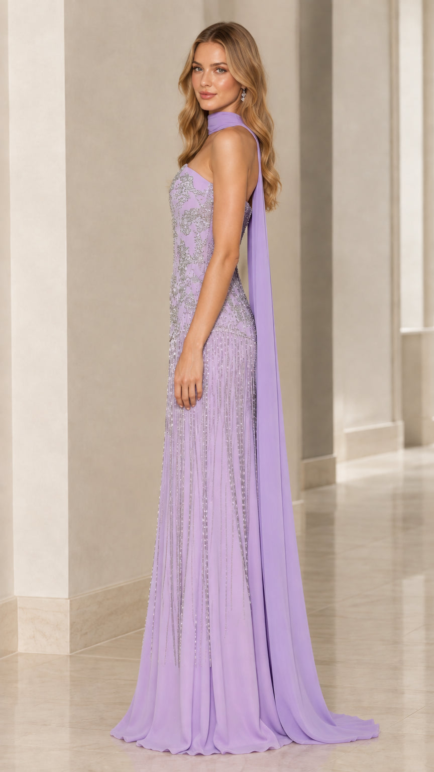 Side profile view of lavender beaded formal gown showing elegant silhouette and cape drape