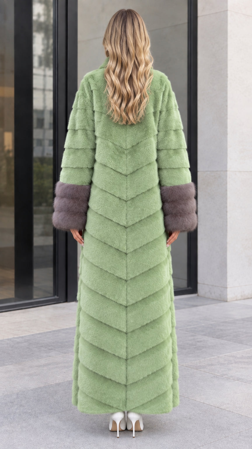Back view of women's sage green chevron faux fur maxi coat