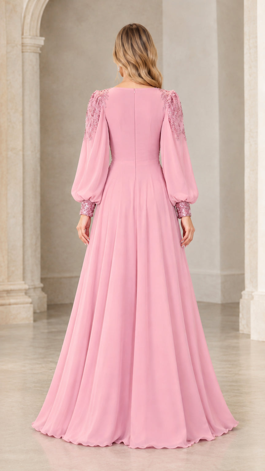Back view of model showcasing pink chiffon maxi dress with back zipper