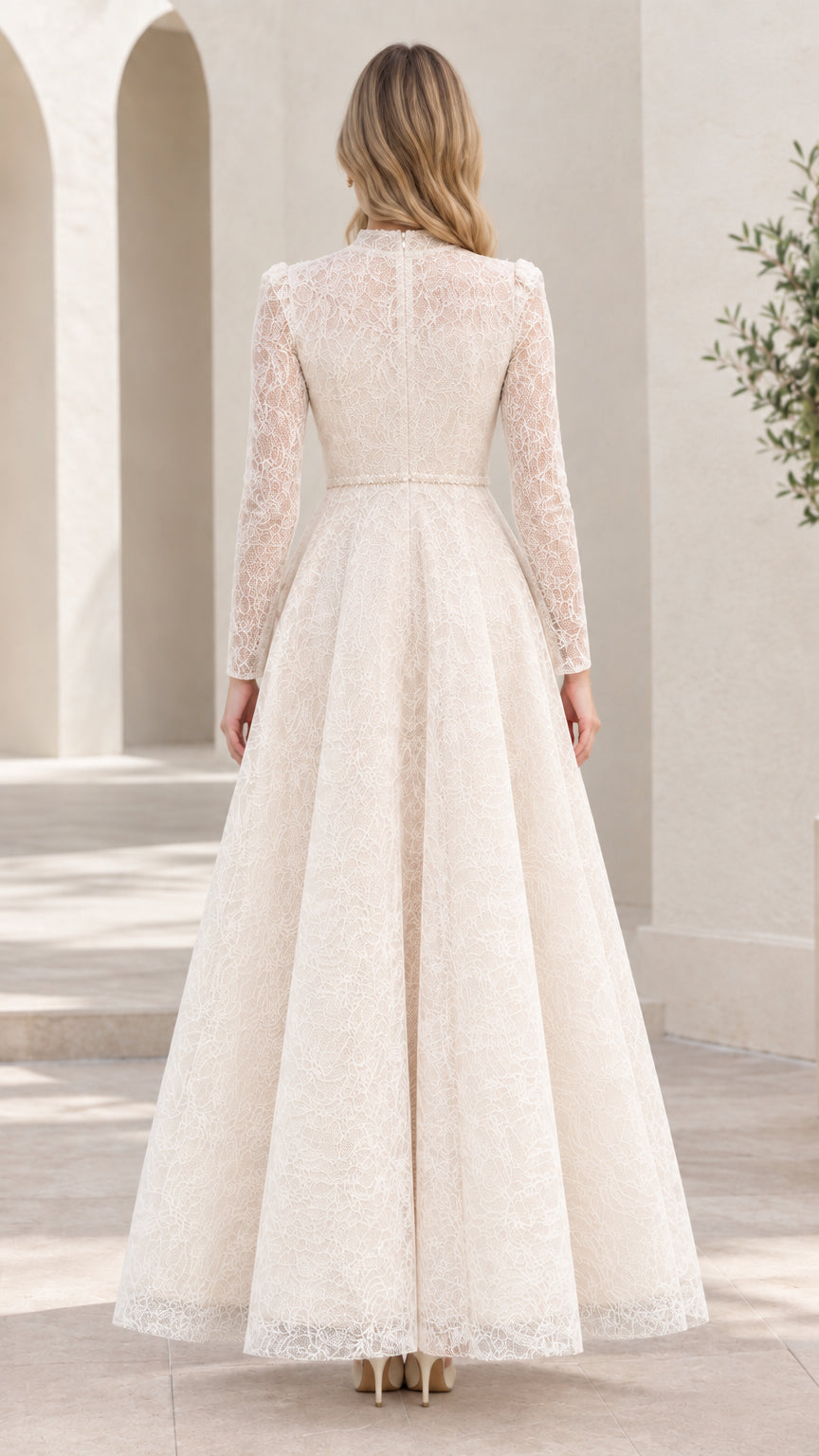 Back view of woman wearing high-neck ivory lace formal maxi dress