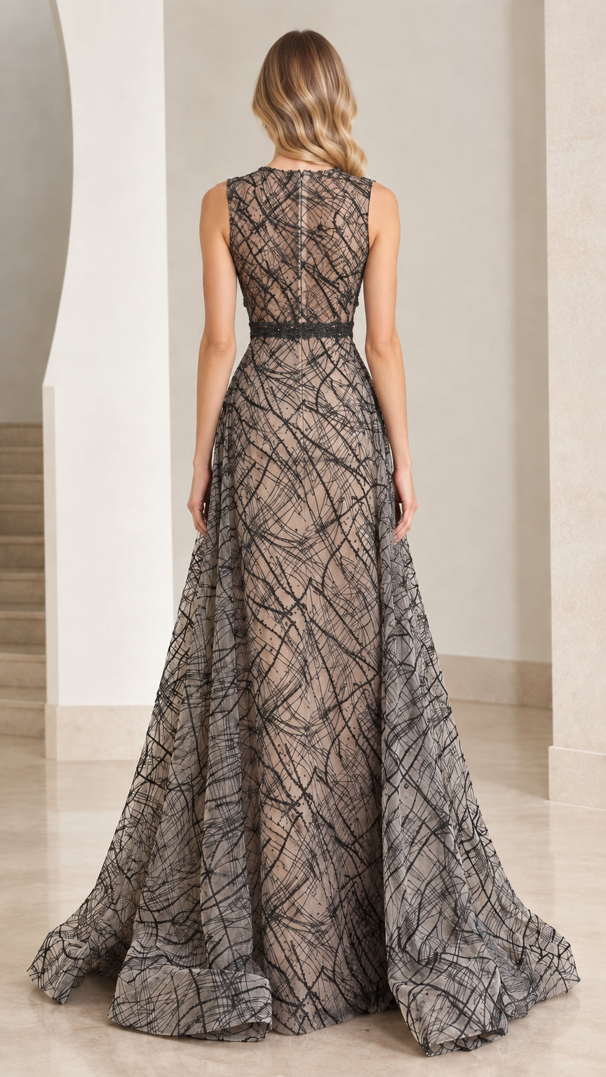 Back view of sleeveless charcoal grey evening gown showing high back and concealed zipper