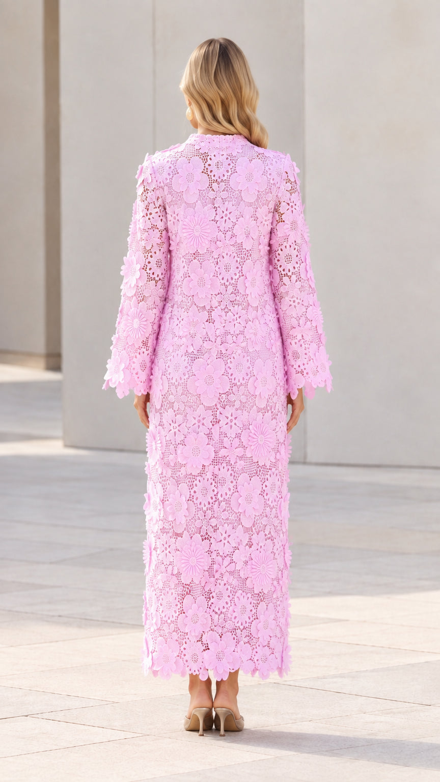 Back view of woman wearing Light Pink lace long sleeve column maxi gown