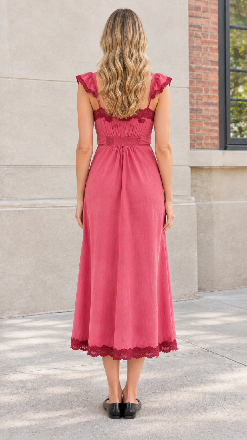 Back view of model in Rose Pink midi dress showing lace trim and back styling
